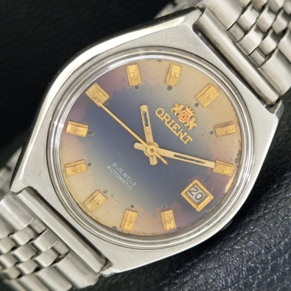 Vintage 1982 Orient Automatic Mens Silver Watch W/daydate & Blue accents